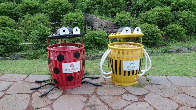 Recycling_bins_at_Ecoland,_Jeju,_South_Korea