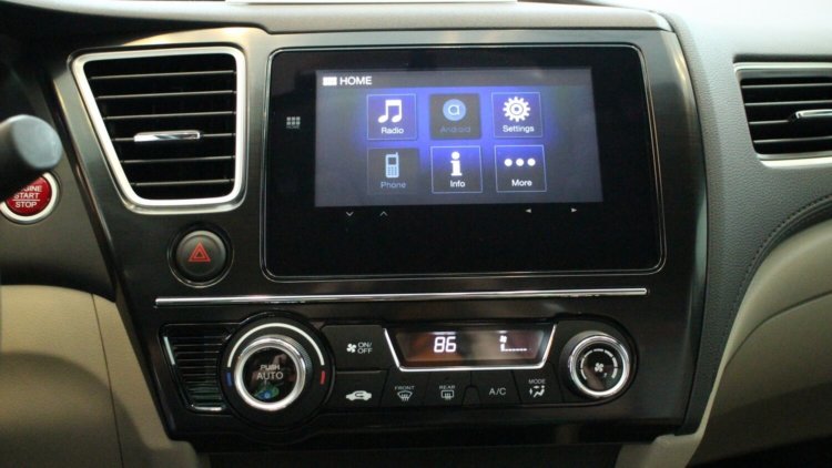 Сможет ли Android Auto повлиять на рынок автомобильной промышленности. Интуитивное управление музыкой. Фото.