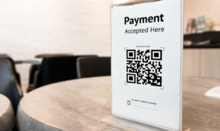 Провести транзакцию через Google Pay будет можно, отсканировав QR-код. Фото.