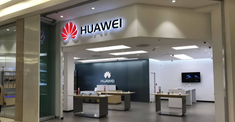 Huawei начала увольнять сотрудников за iPhone. Фото.