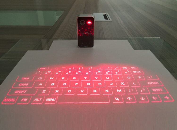 Классная лазерная клавиатура. Лазерная клавиатура пригодится в поездках. Фото.