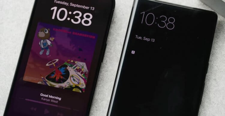 Always On Display — уведомления. На Айфоне отображается музыкальный плеер, в то время как на Андроиде — только часы и значок уведомления. Фото.