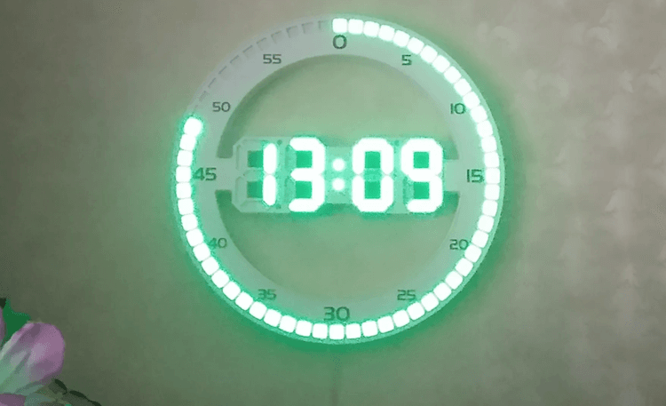 Необычные светящиеся часы. Кольцо по кругу — секунды. Фото.