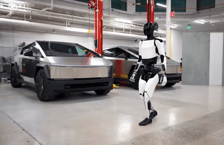 Электромобили Tesla все? Илон Маск сделал ставку на продажи роботов Optimus. Этот робот может стать для Tesla важнее электромобилей. Изображение: Мотор. Электромобили Tesla все? Илон Маск сделал ставку на продажи роботов Optimus. Этот робот может стать для Tesla важнее электромобилей. Изображение: Мотор. Фото.