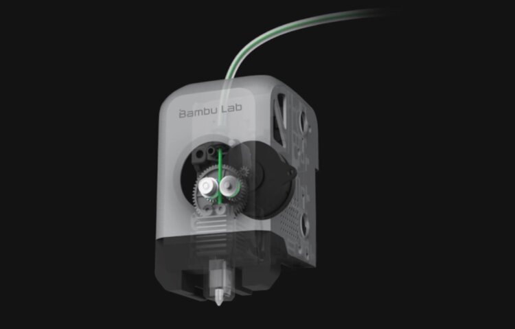 Недорогой 3D-принтер с быстрой печатью. Печатающая головка оснащена экструдером с прямым приводом (Direct‑Drive) и имеет встроенный датчик, который определяет, когда заканчивается филамент. Недорогой 3D-принтер с быстрой печатью. Печатающая головка оснащена экструдером с прямым приводом (Direct‑Drive) и имеет встроенный датчик, который определяет, когда заканчивается филамент. Фото.