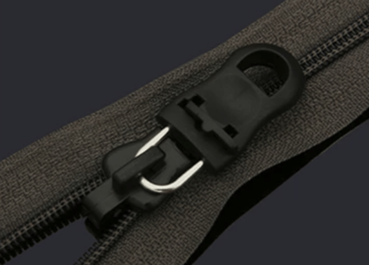 Ручка для ремонта молнии на сумке и одежде. Изображение: AliExpress. Фото.