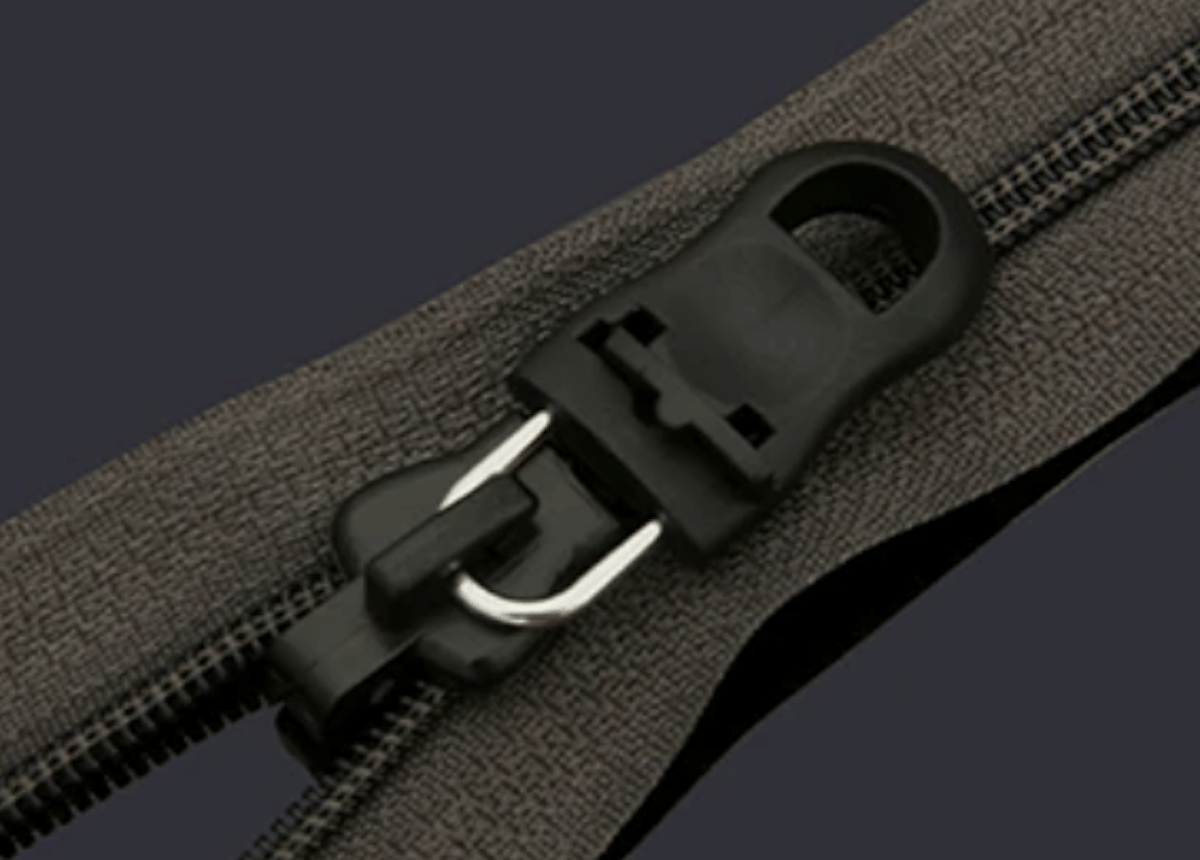 Ручка для ремонта молнии на сумке и одежде. Изображение: AliExpress. Фото.