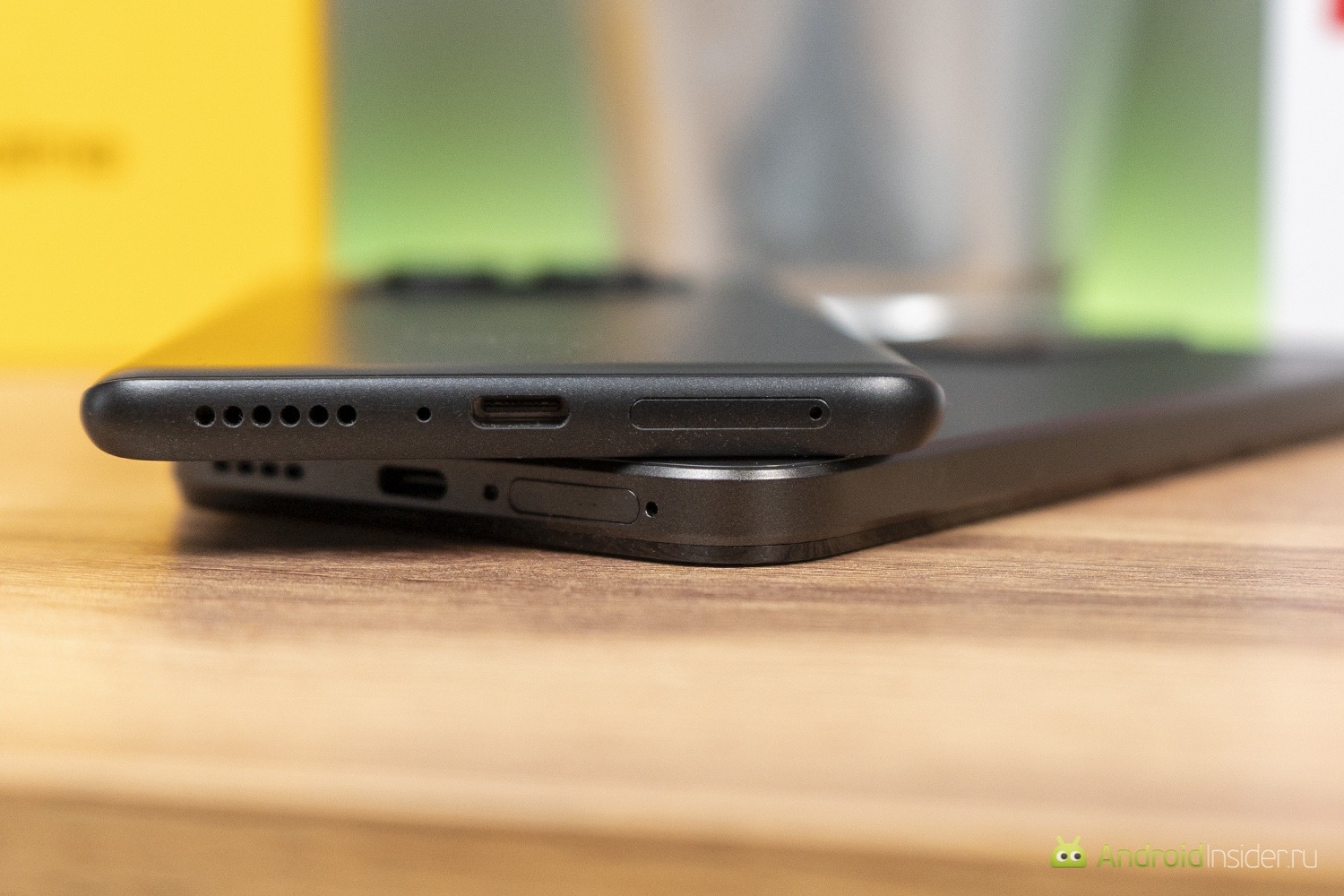 Дизайн и размеры: лёгкий Redmi против защищённого realme. На глаз толщина незаметна. Фото.