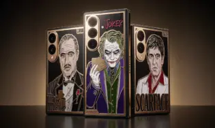 Luxury modified Samsung Galaxy Z Fold 8 with 24K gold frame and hand-painted enamel back panel, studio lighting